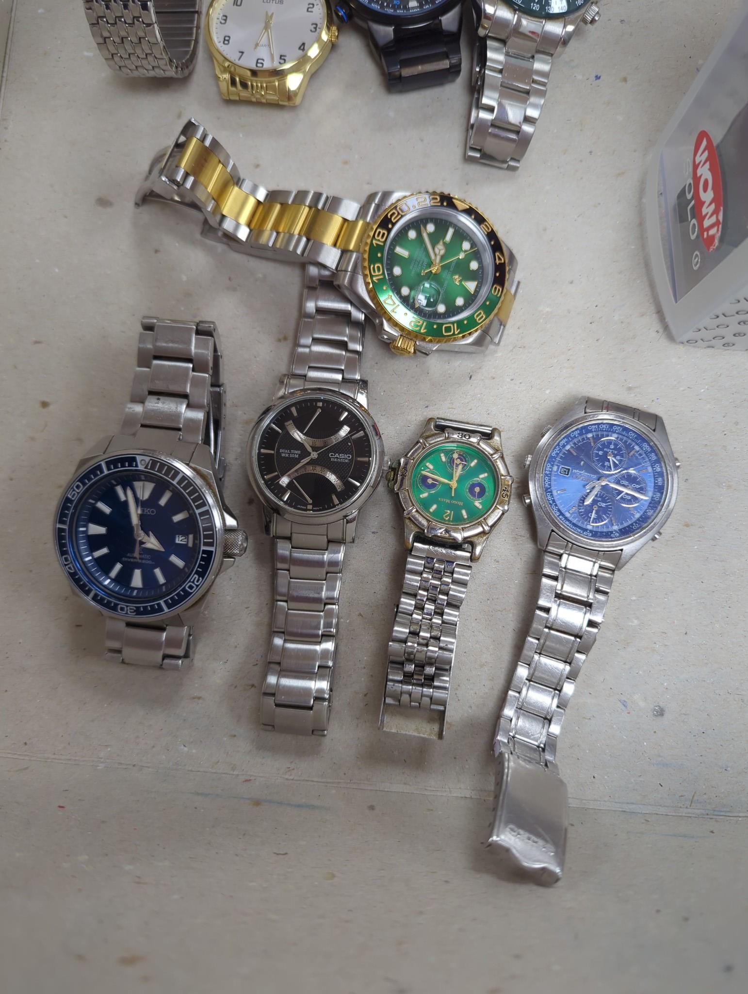 Twenty assorted gentleman's modern wrist watches including Design Lige Watch 1856, Seiko Automatic Divers, Seiko 5 Sport, Seiko Connoisseur quartz, Citizen Ecodrive, Casio Beside, Pagani Design, Maurice Lacroix, Morellat